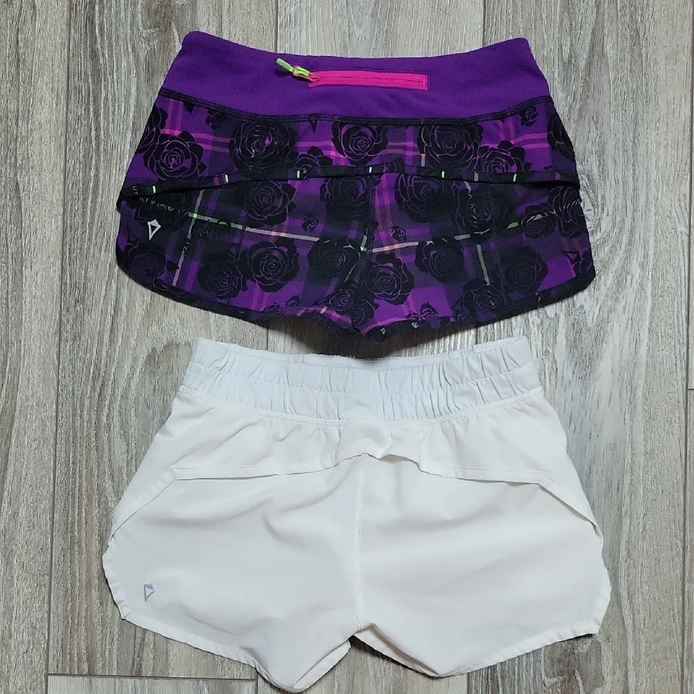 Ivivva By Lululemon Bundle of 2 Pair of Soze 10 Shorts Solid White Purple Floral